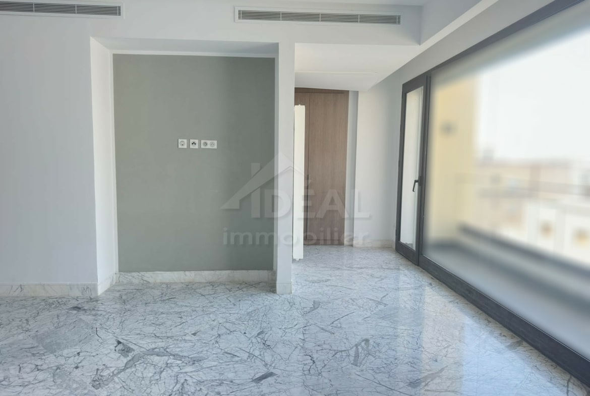Salon avec Balcon– appartement au Lac 2