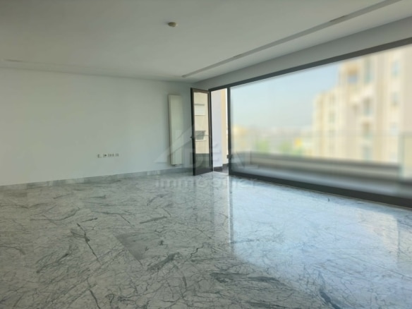 Salon avec balcon – appartement au Lac 2