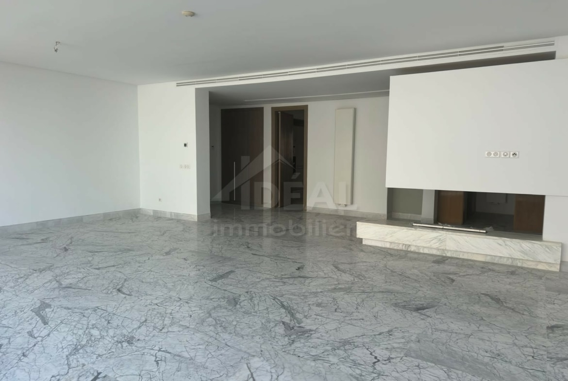 Salon avec cheminée – appartement au Lac 2