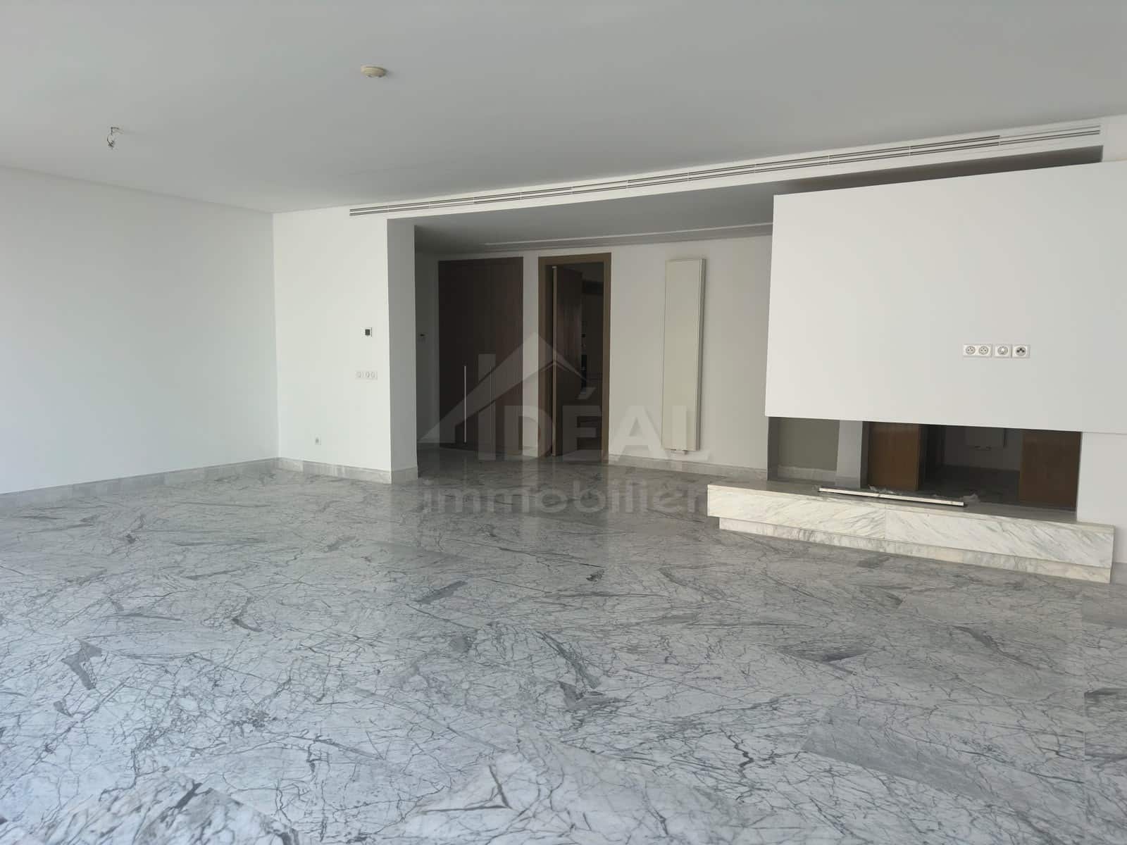 V26-005-009 Salon avec cheminée – appartement au Lac 2